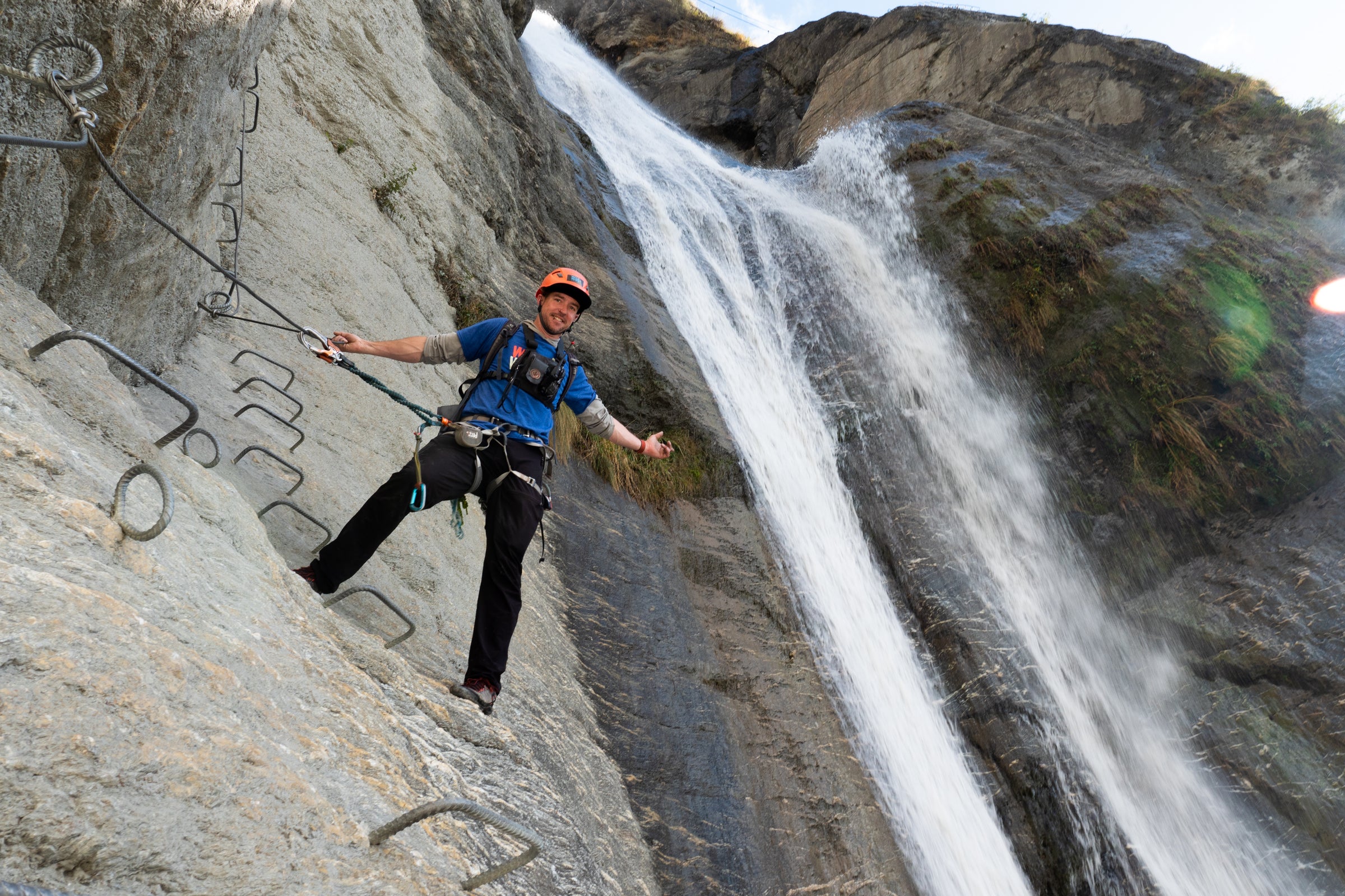 Jeff hanging out over a rock face at Wild Wire Wānaka