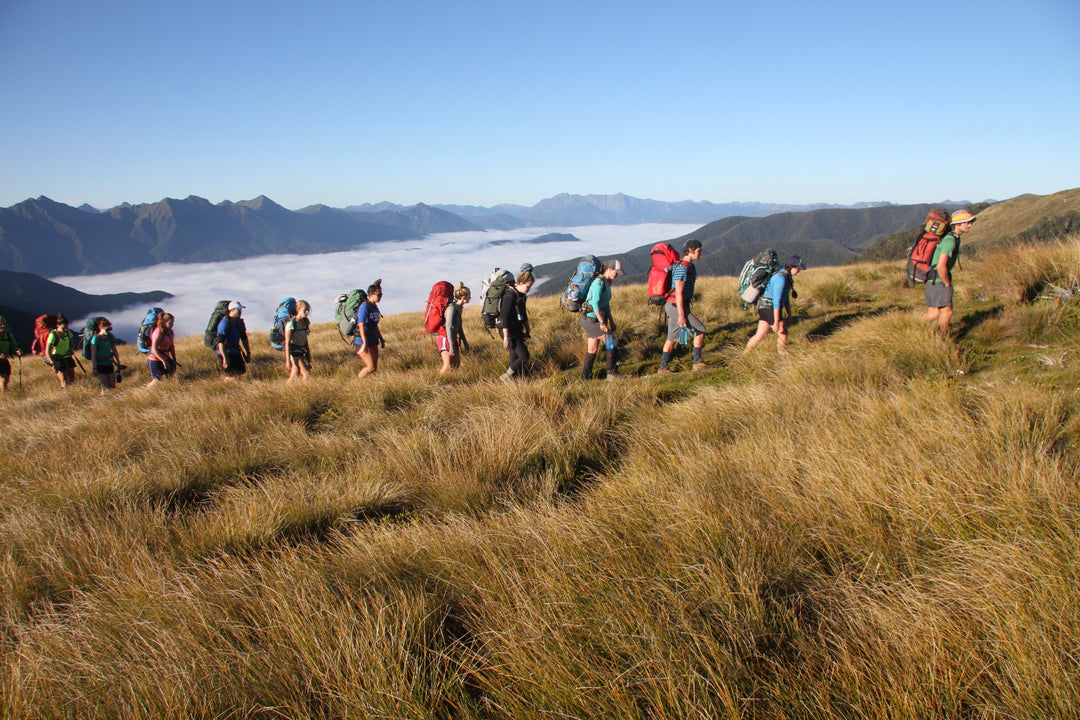 Adventure Guide Leads Students in Tussock Hike