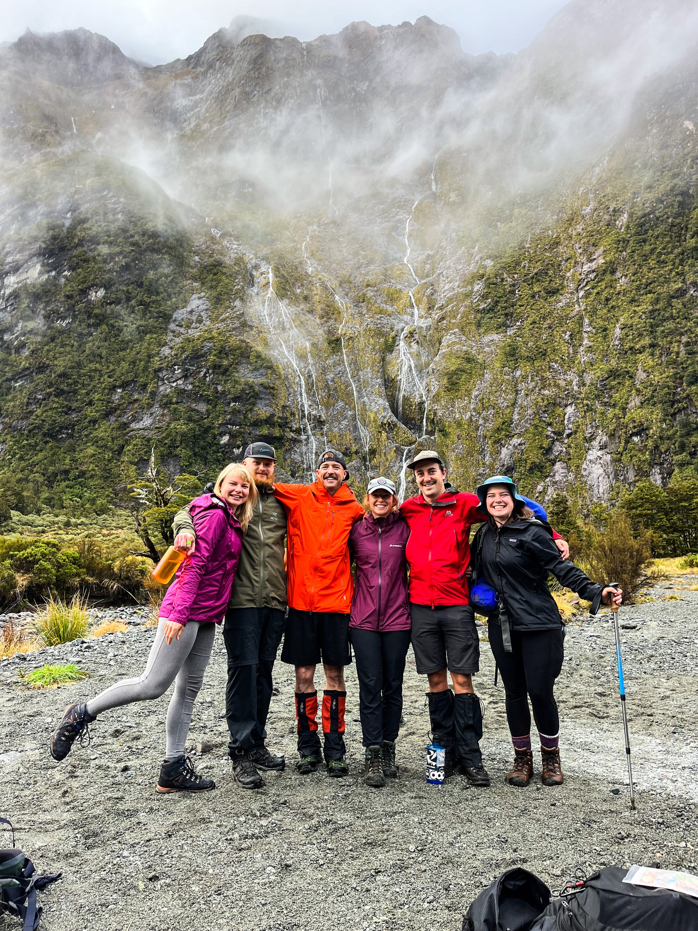 Group photo of students after they have hiked to a waterfall